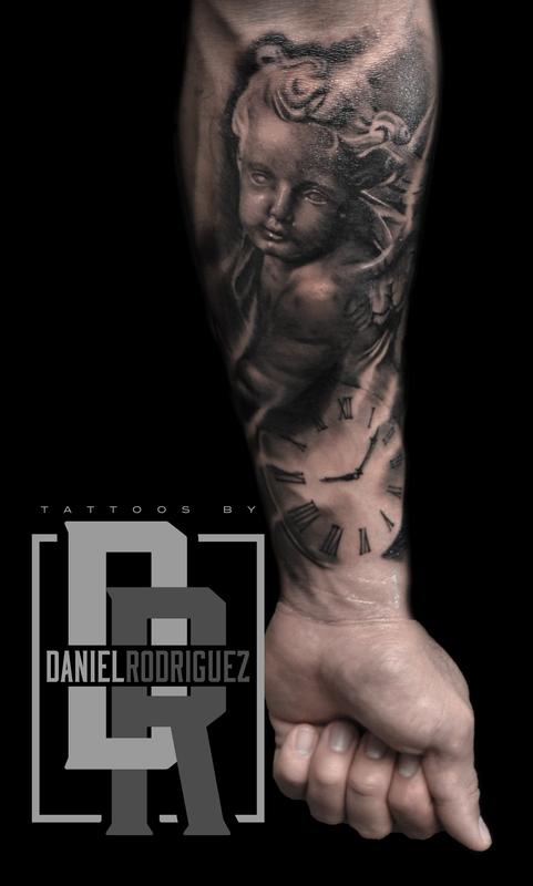 Cherub clock tattoo