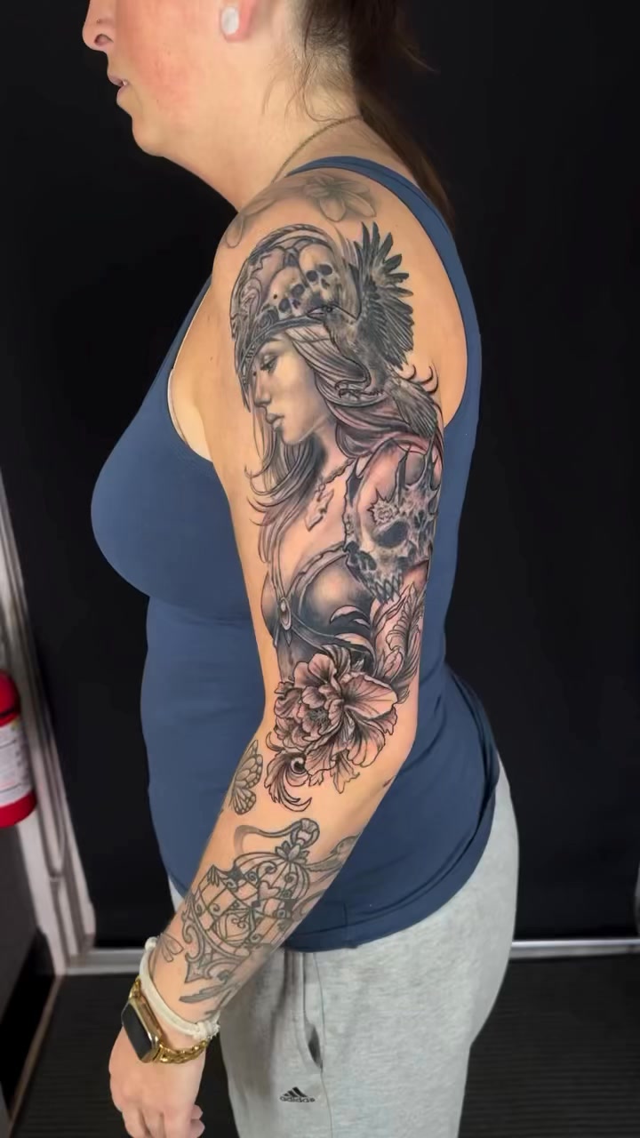 Illustrative goddess and skull sleeve in black-and-grey