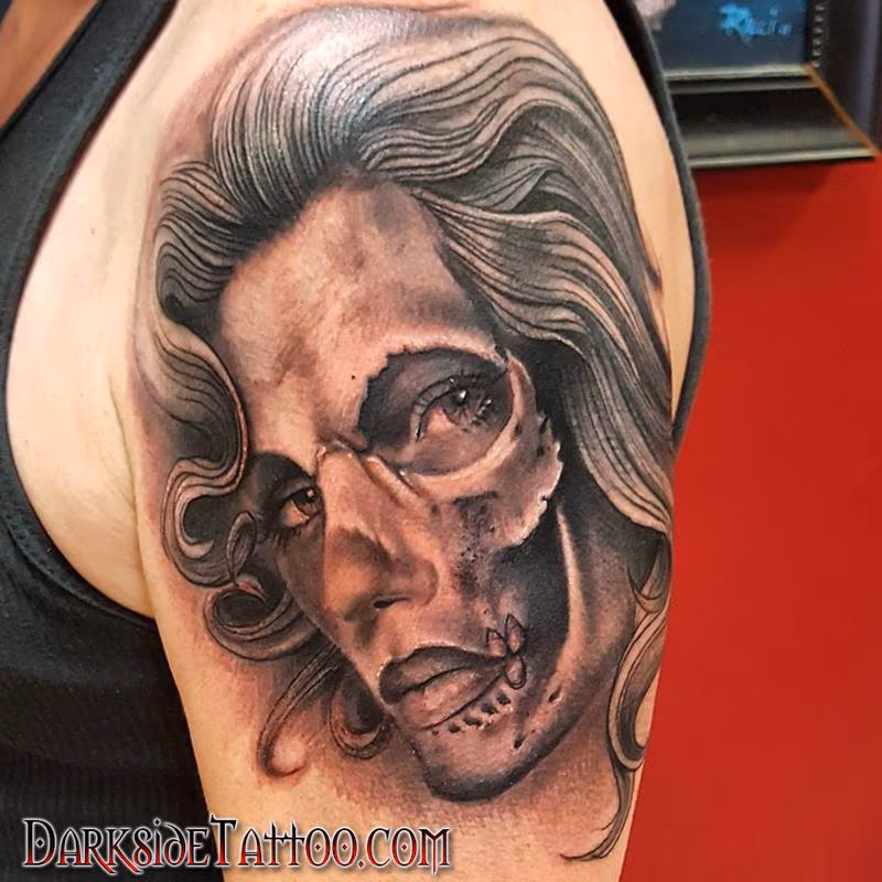 Black and Gray Skull Face Tattoo