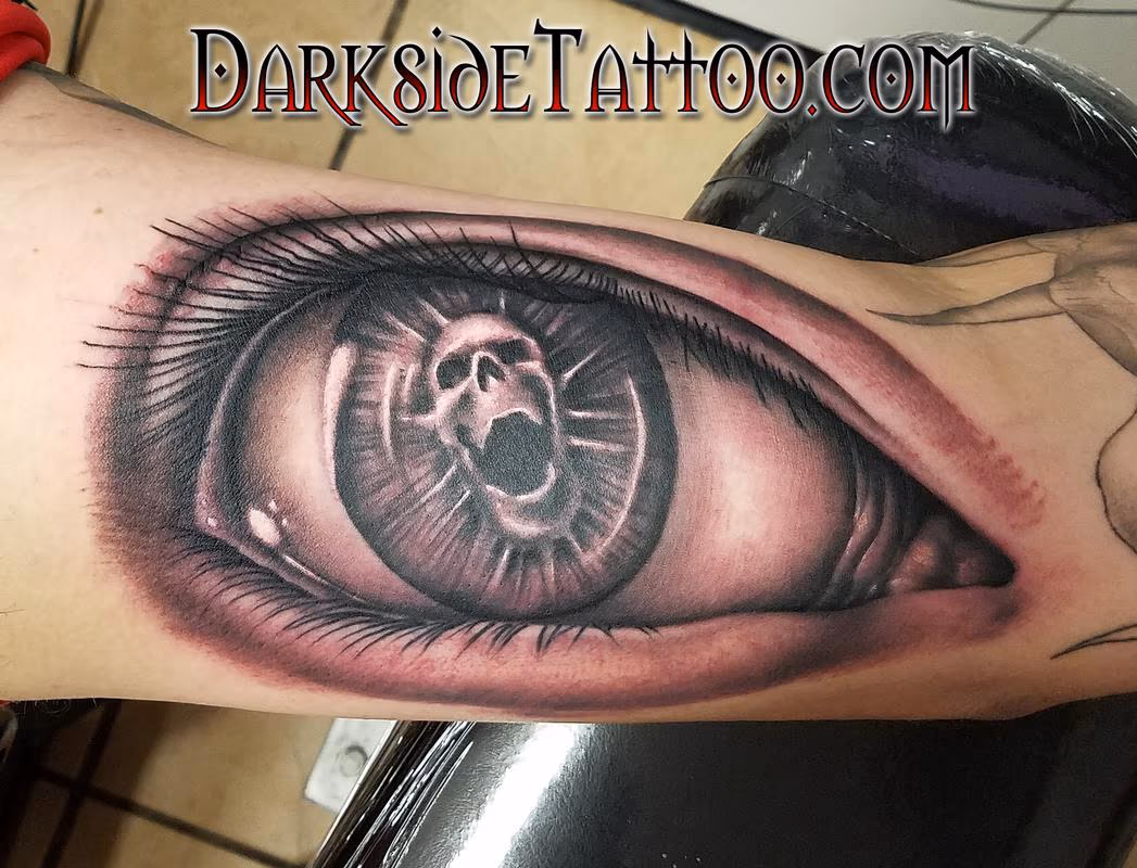 Black and Gray Skull Eyeball Tattoo