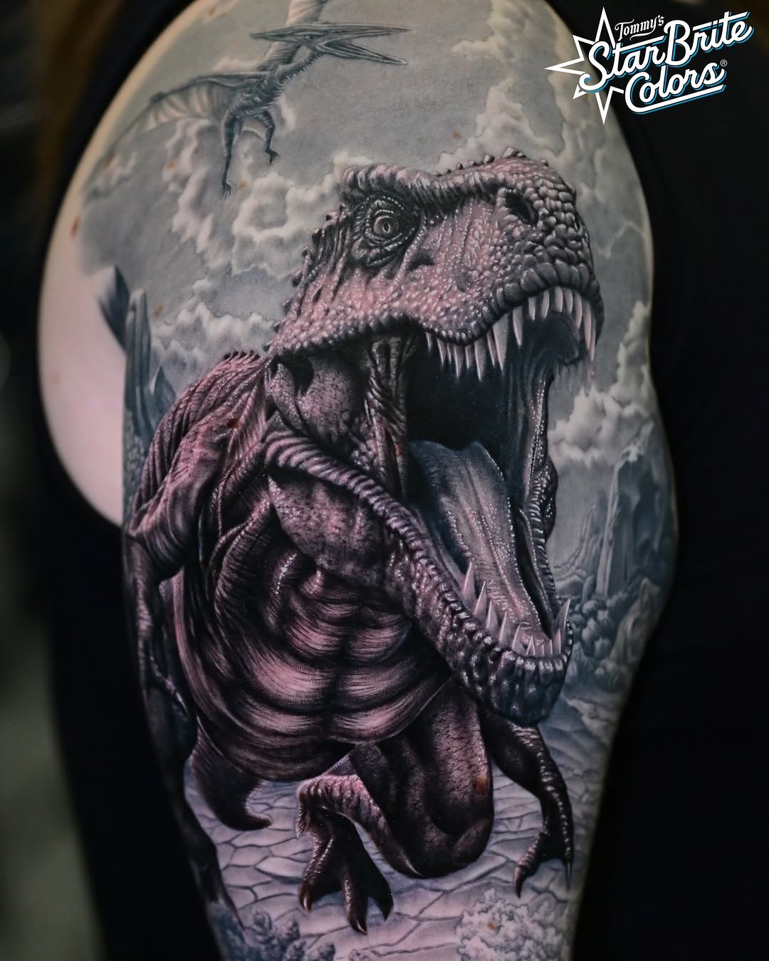 Realistic T-Rex half sleeve tattoo