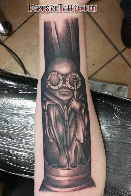 Black and Gray Giger Baby Tattoo
