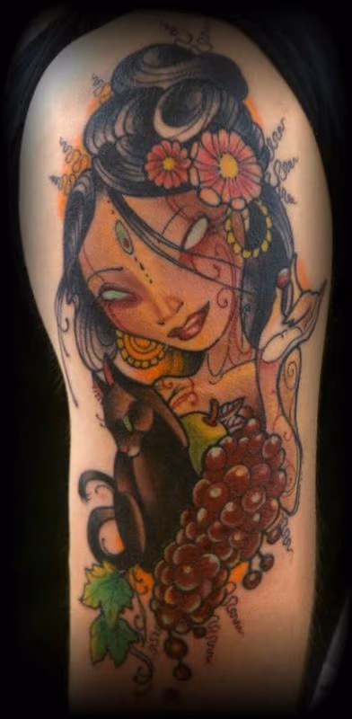 Lady with grapes tattoo