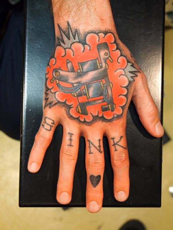 tattoo machine hand tattoo