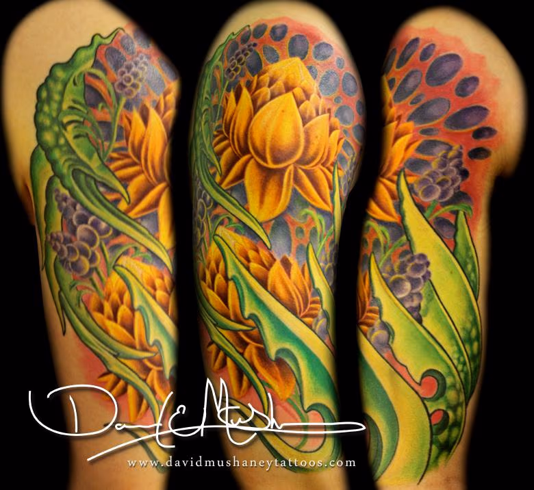 Lotus Flower and Bio-Organic Half-Sleeve Tattoo