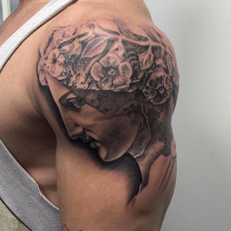 Black and Grey Greek Statue