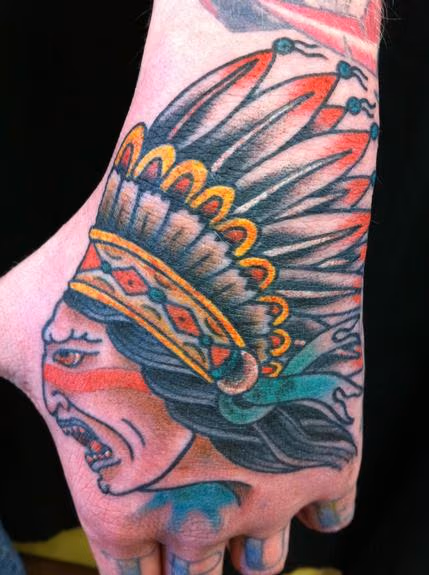 Indian head hand tattoo