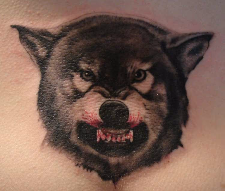 Growling wolf tattoo