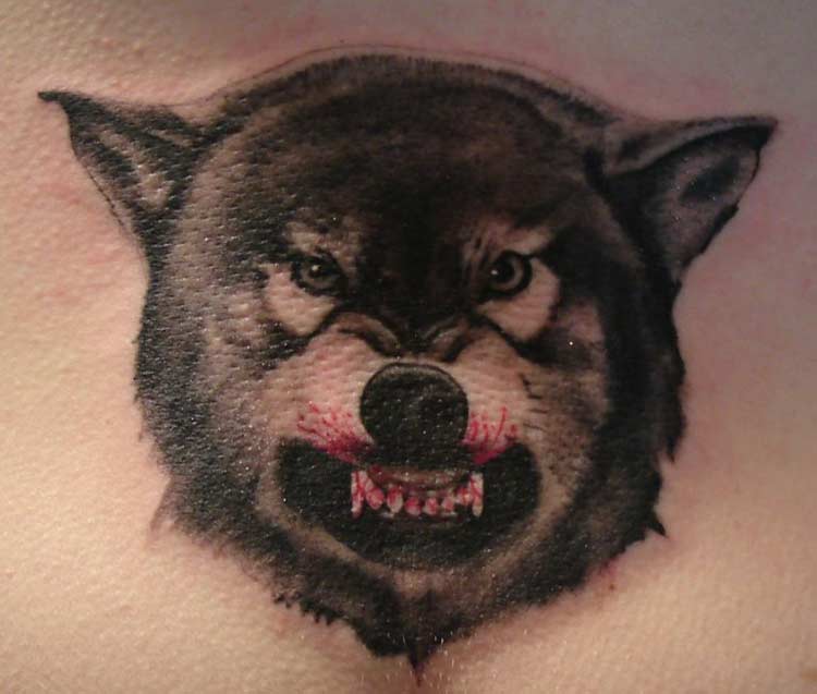 Growling wolf tattoo