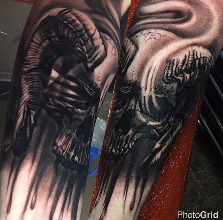 black and grey skull tattoo