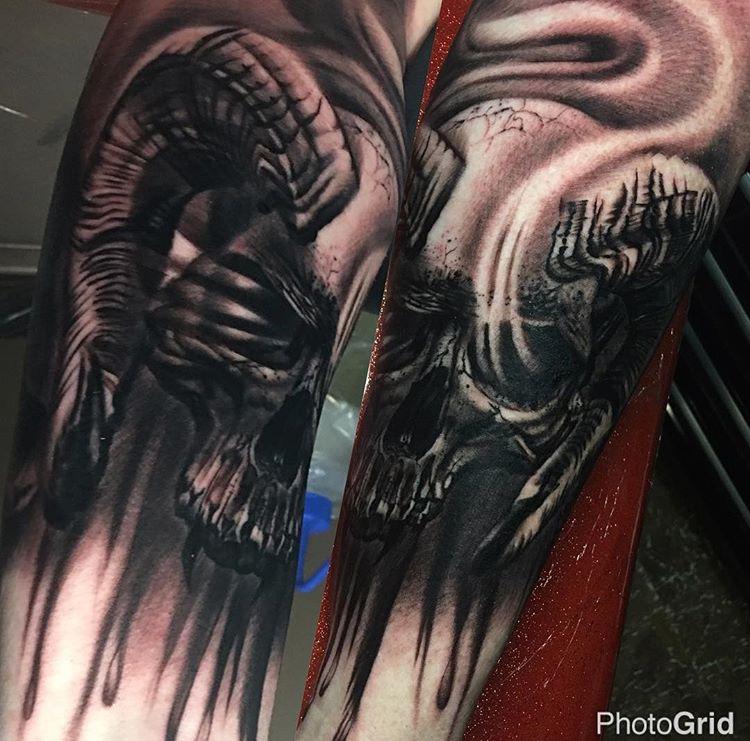 black and grey skull tattoo
