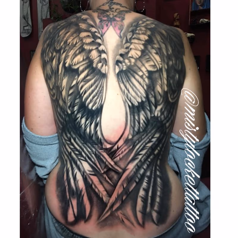 Black and grey angel wings