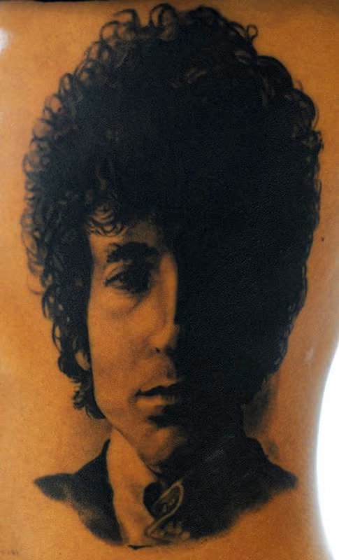 Bob Dylan portrait tattoo