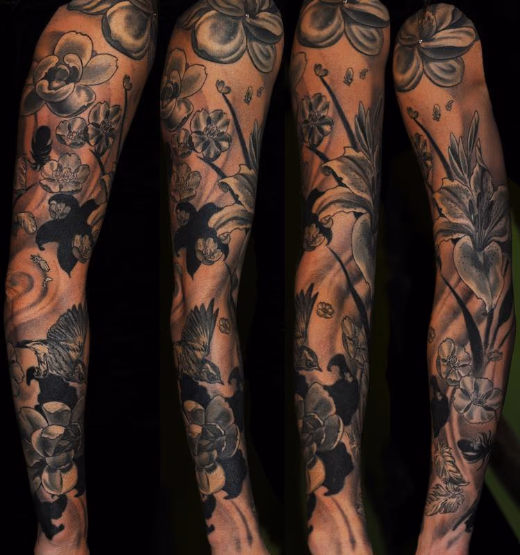 Black and Grey Flowers, Feathers and Bird Tattoo