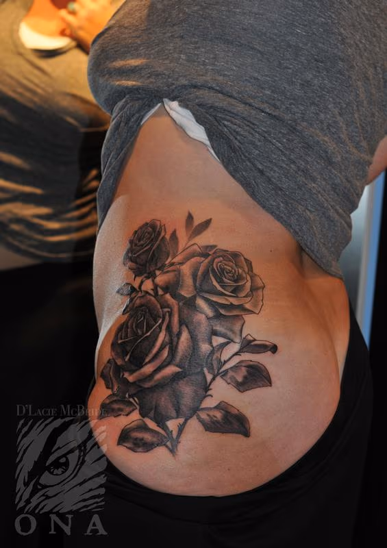 black and grey rose flower tattoo