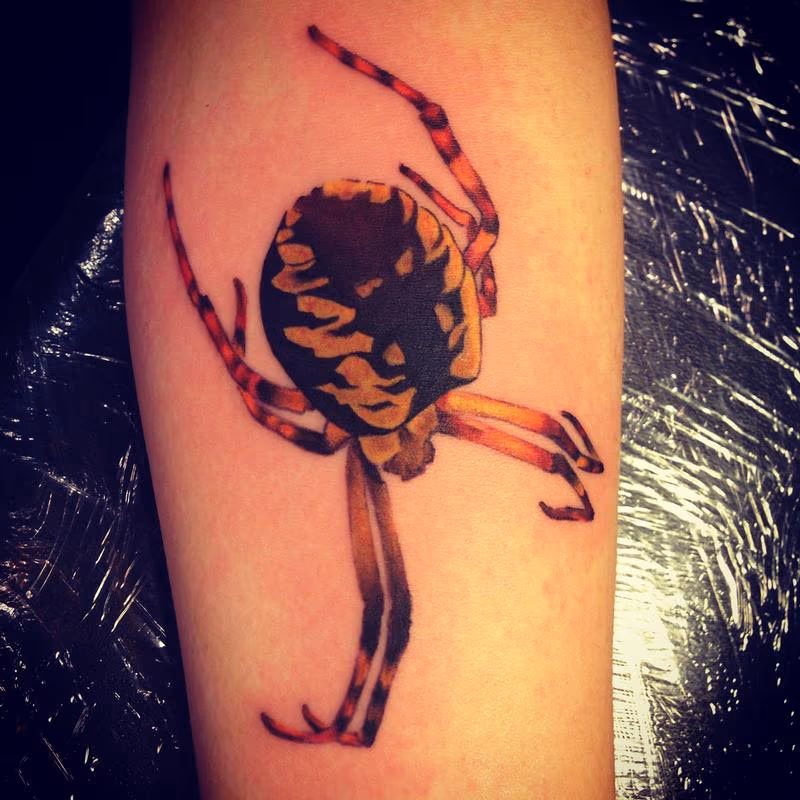 yellow orange spider tattoo
