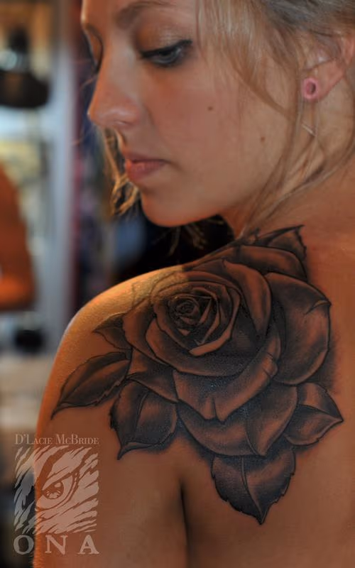 black and grey rose flower tattoo