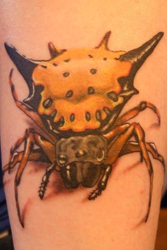 yellow spiny spider tattoo