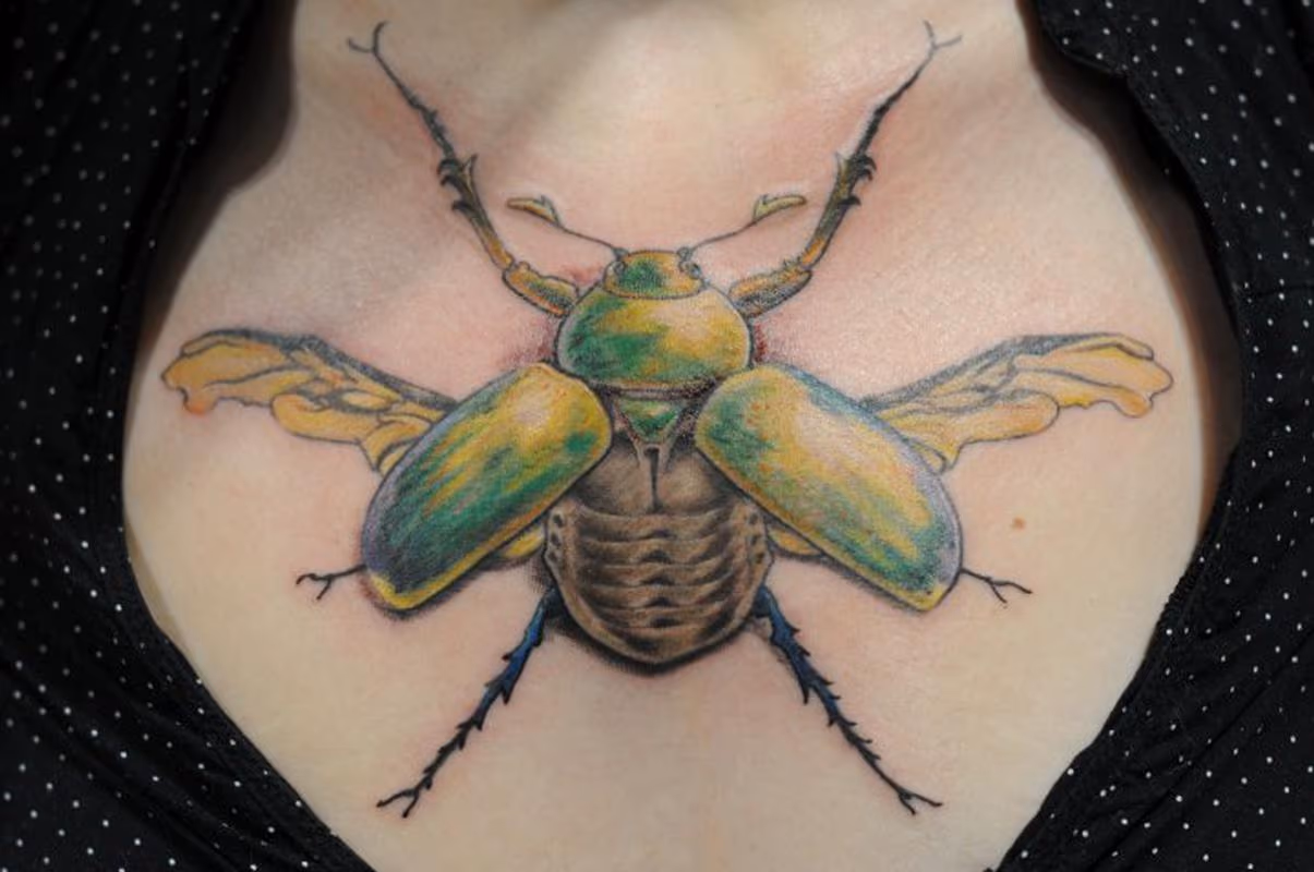 scarab beetle bug chest tattoo