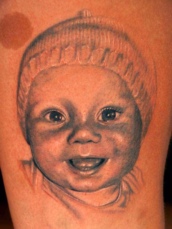 Baby portrait tattoo