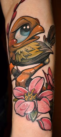 Birdie and flower tattoo