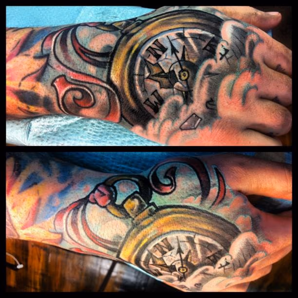 Compass hand tattoo