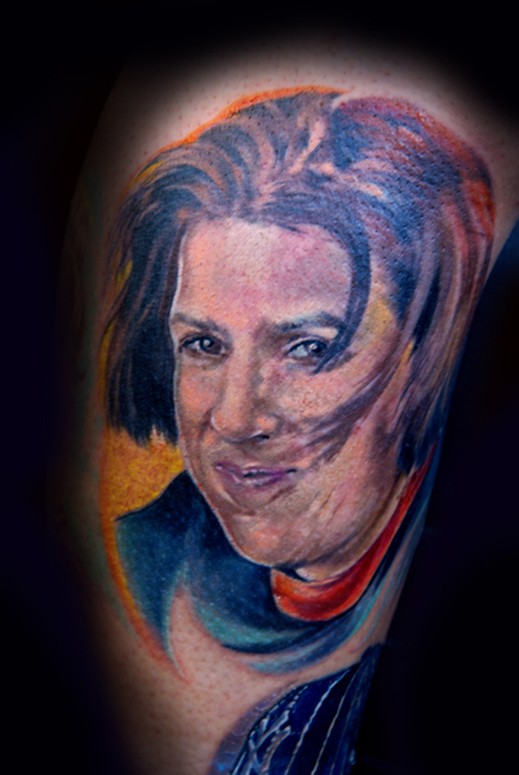 Sorry about the bad photo. I will make another attempt when the tattoo portrait heals. This is part of a leg sleeve I am working on.