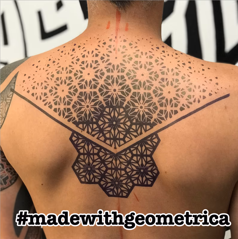 geometric back tattoo