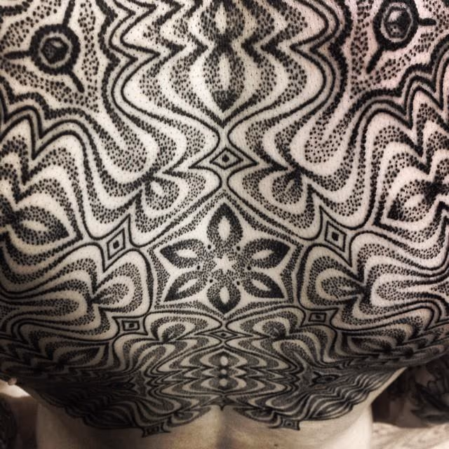 blackwork back tattoo