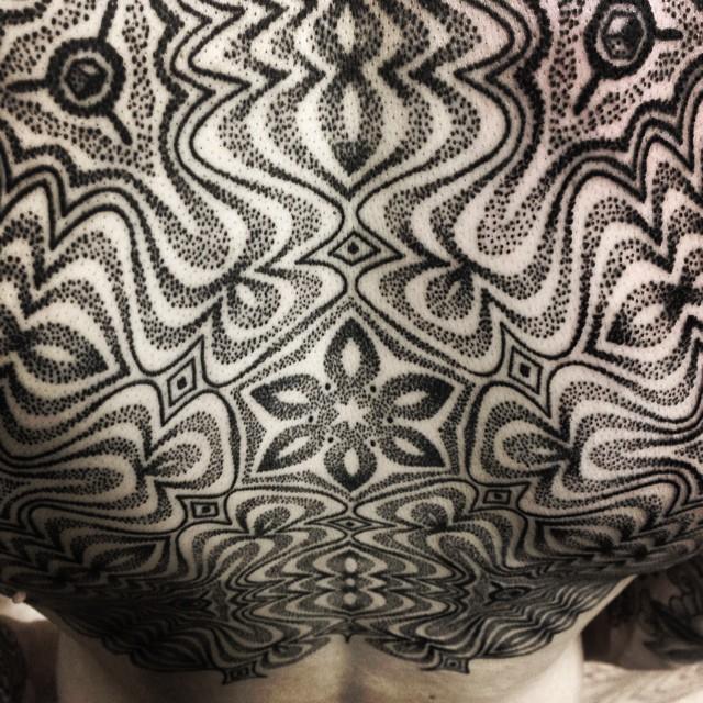 blackwork back tattoo