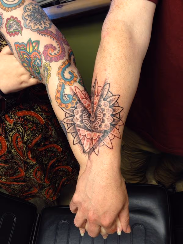 adjoining couple tattoo