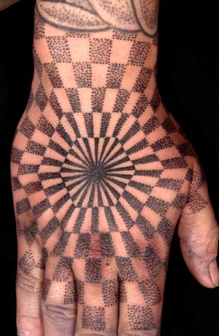 Optical illusion hand tattoo