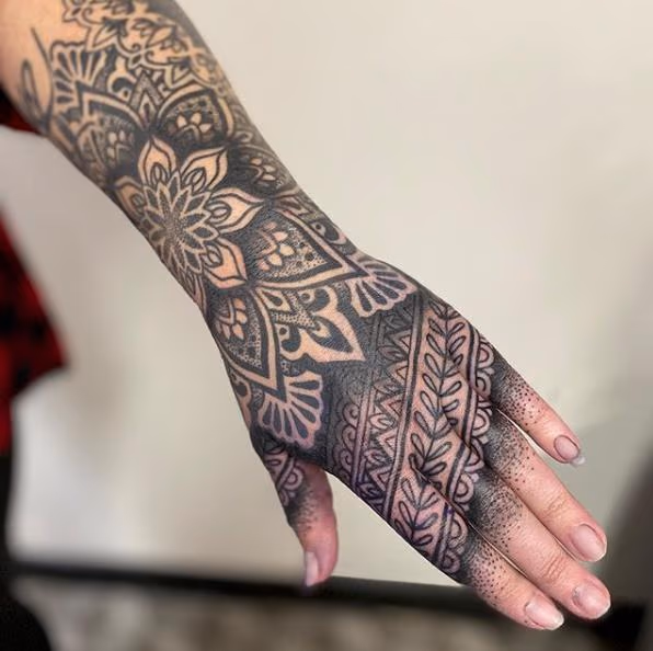 Blackwork hand tattoo