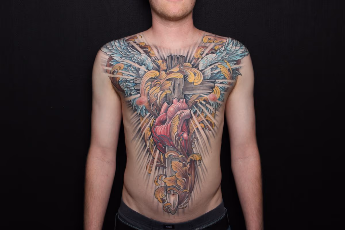 Heart, cross, sword and wings chest piece