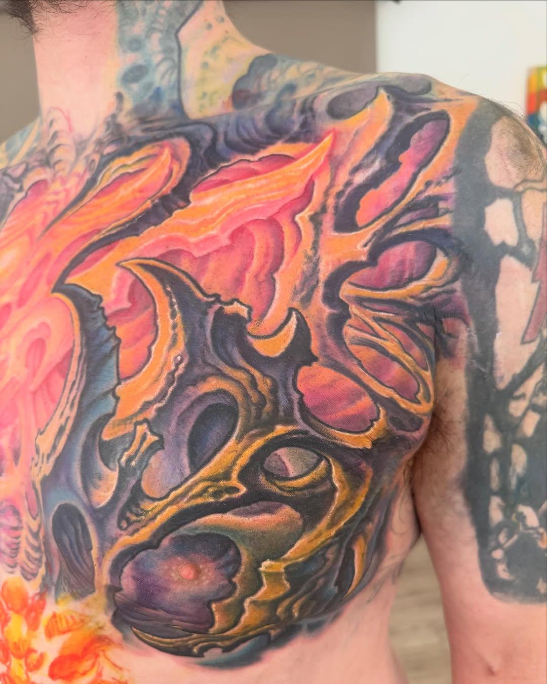 Biomechanical chest piece in fiery color