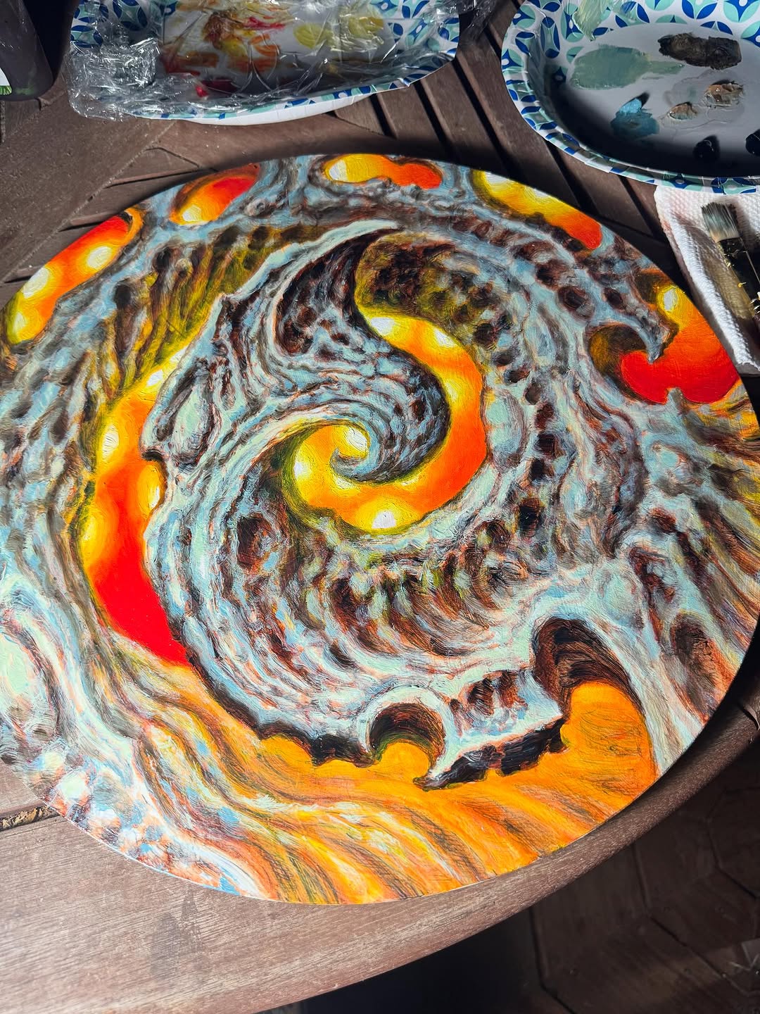Surreal swirling oil painting on round panel
