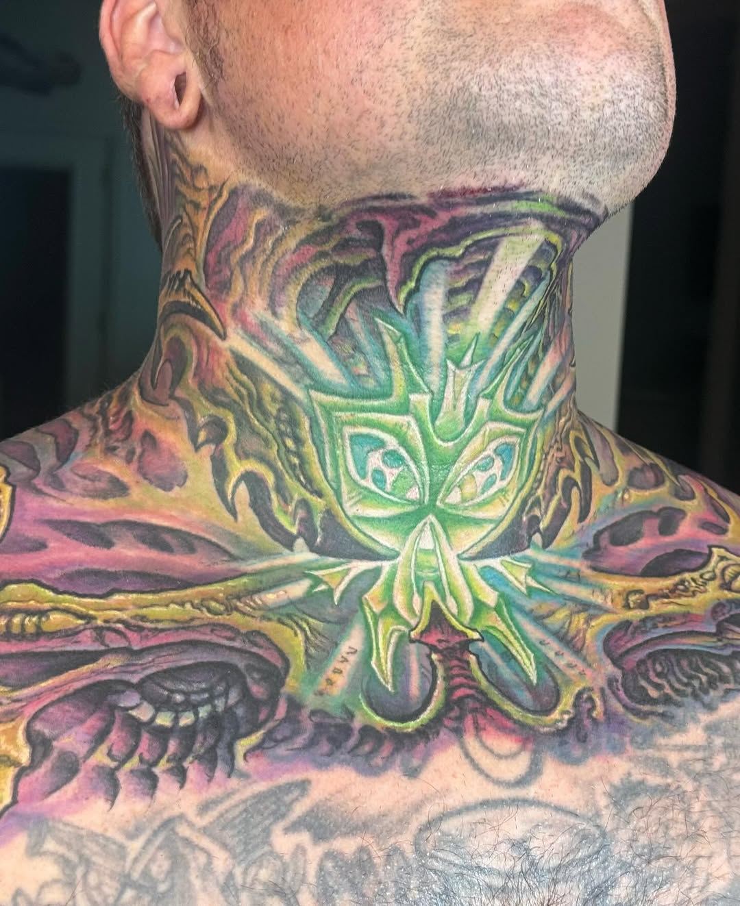 Biomechanical alien lightform neck tattoo in color