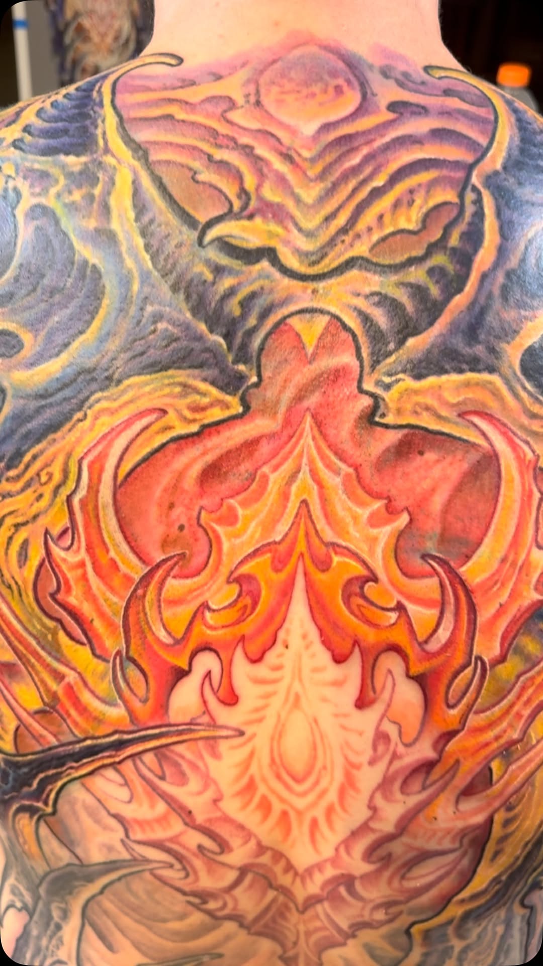Biomechanical flame back piece in color