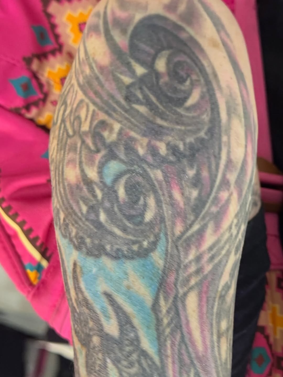 Biomechanical scarab and spirals, half-sleeve