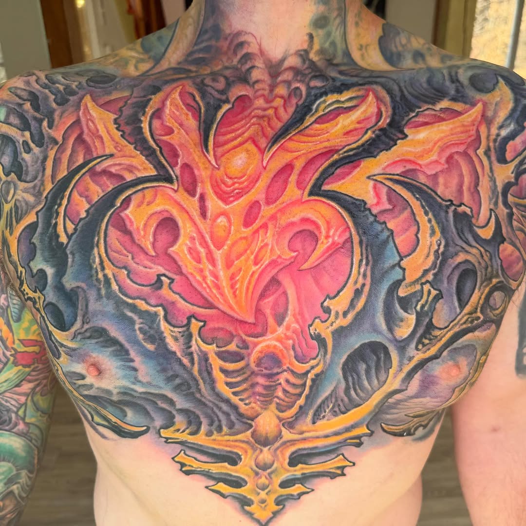 Biomechanical chest piece in pink and orange