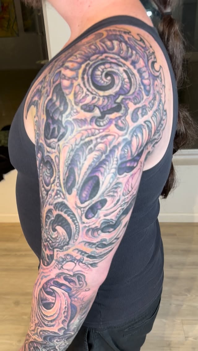 Biomechanical coverup full sleeve in purple
