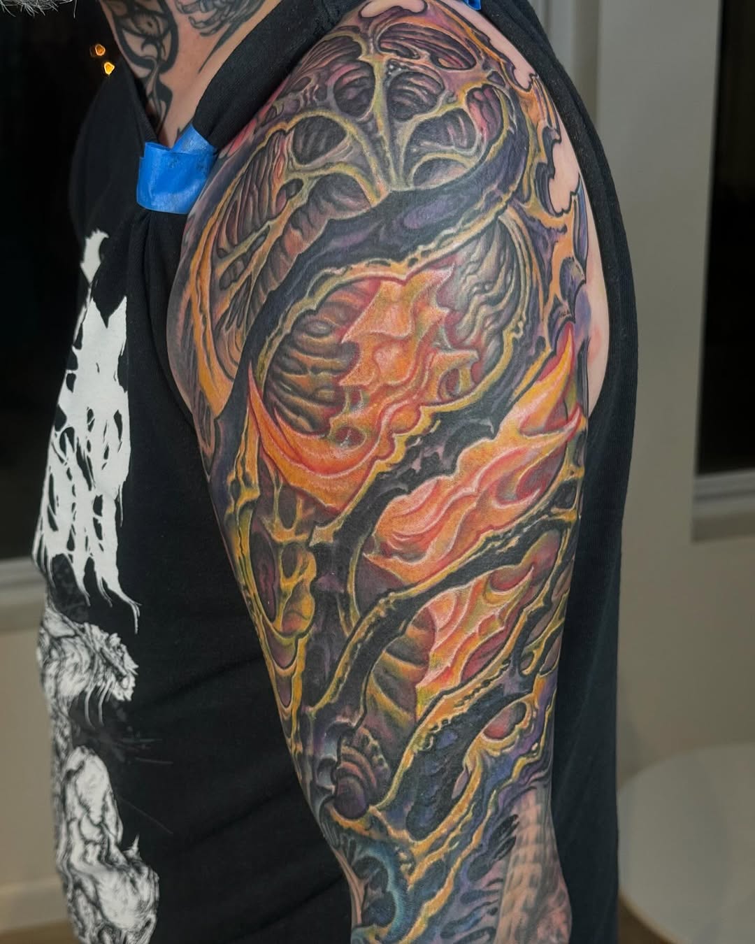 Biomechanical color half-sleeve, fiery cover-up