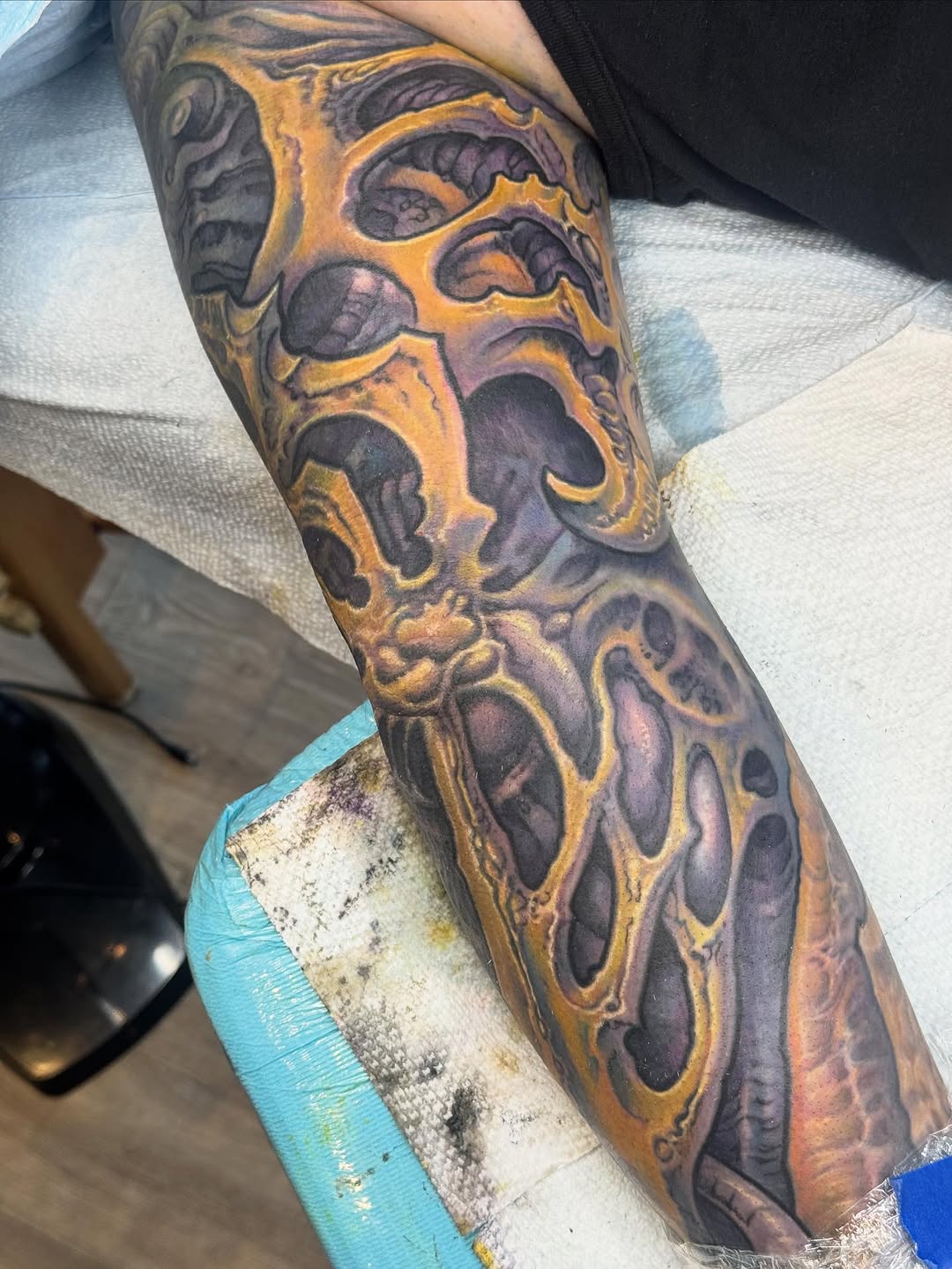 Biomechanical coverup sleeve in purple and orange