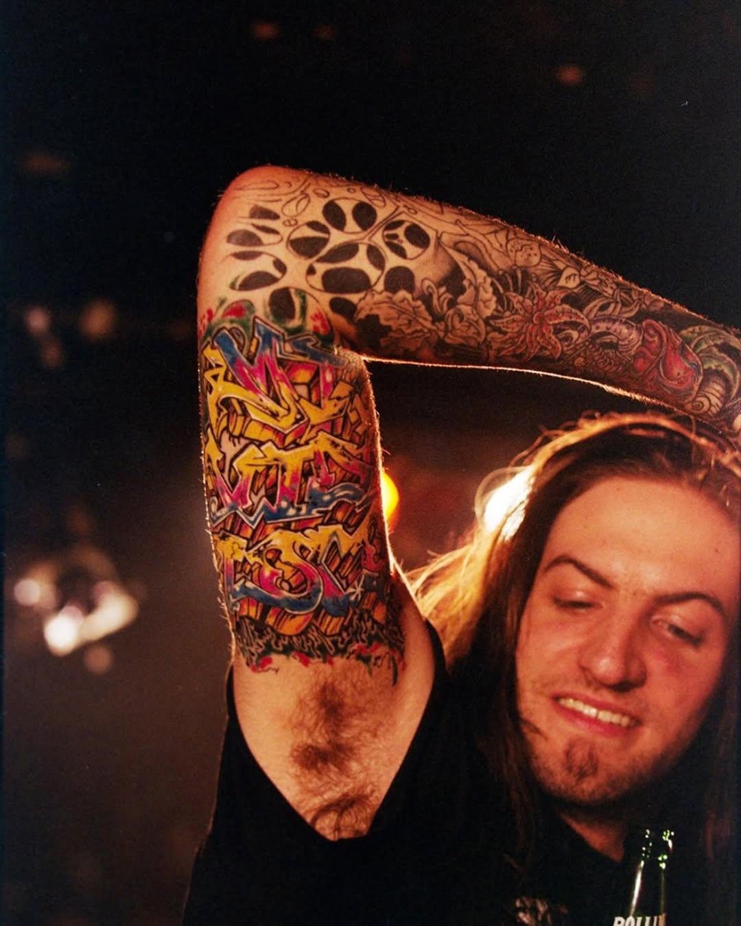 Wildstyle graffiti sleeve tattoo in color