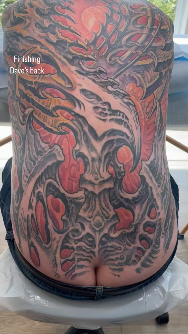 Biomech back piece in red and black