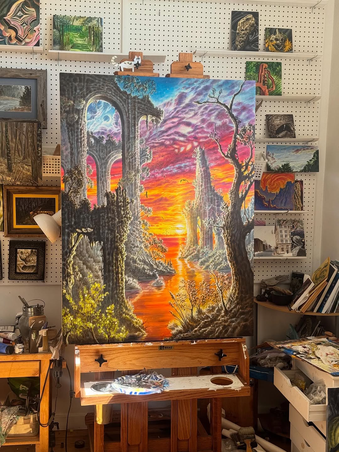 Sunset landscape painting with stone arches