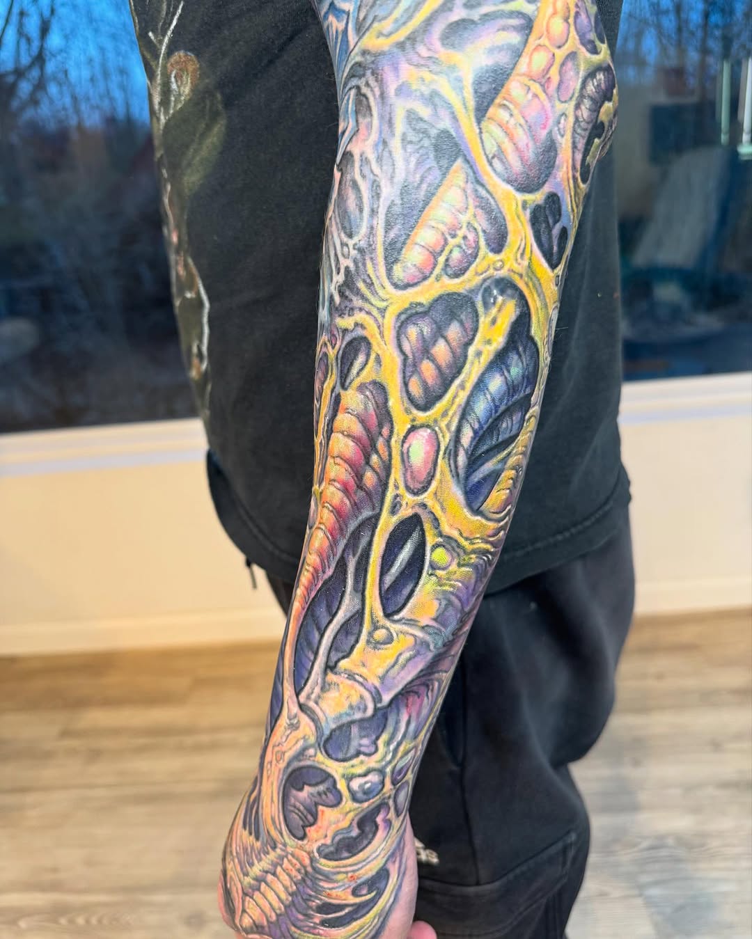Colorful biomech full sleeve coverup tattoo