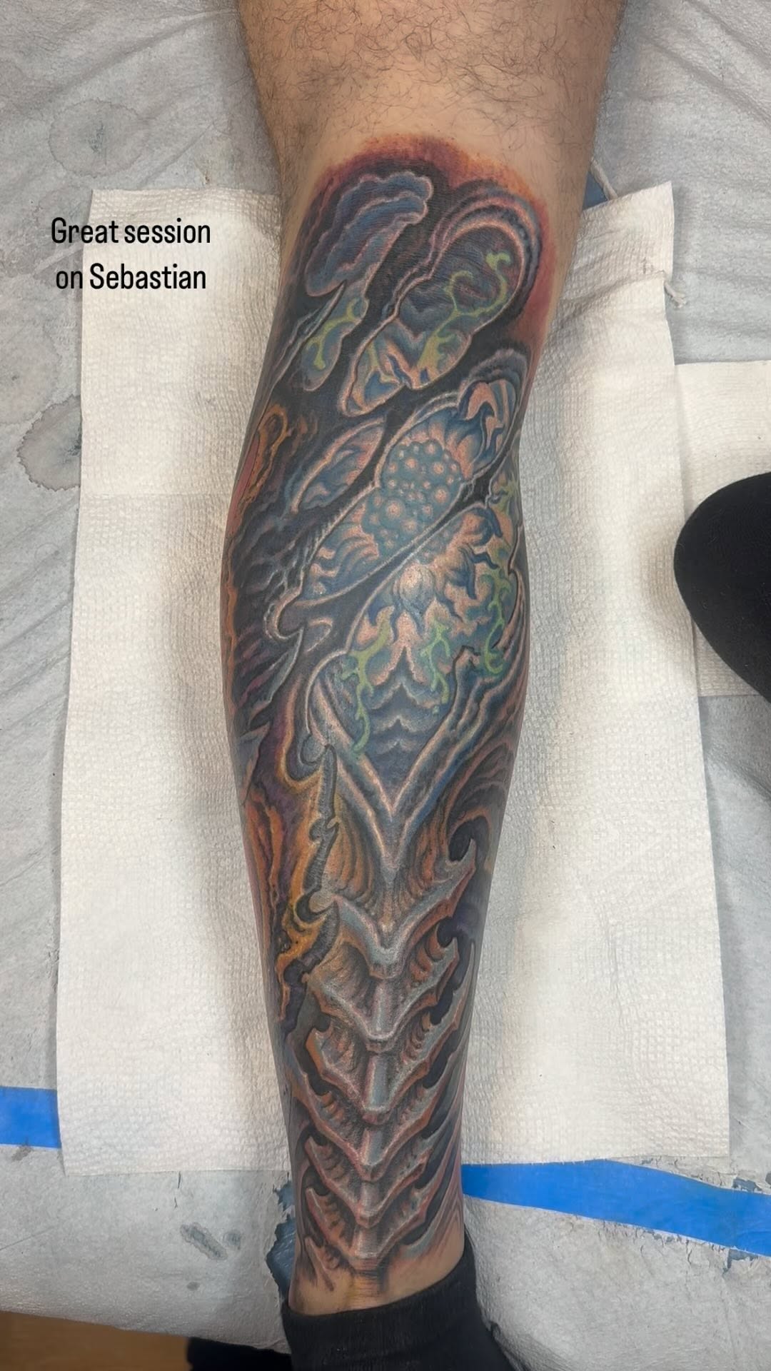Biomechanical bio-organic calf tattoo in color