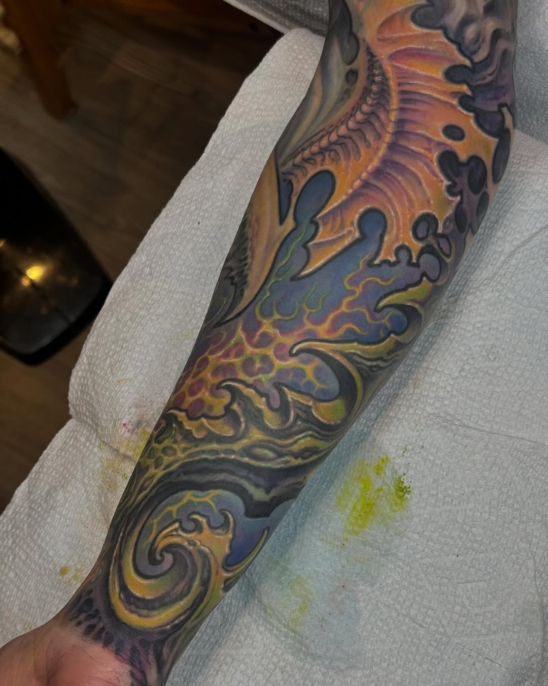 Biomechanical color full-sleeve tattoo