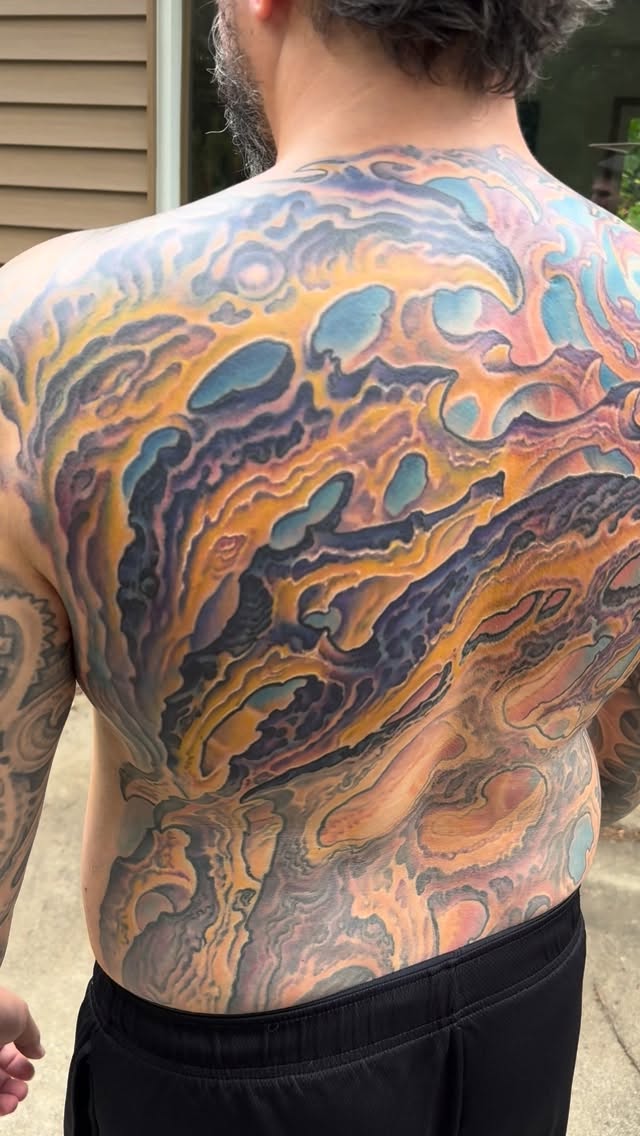 Biomechanical back piece in color, second session